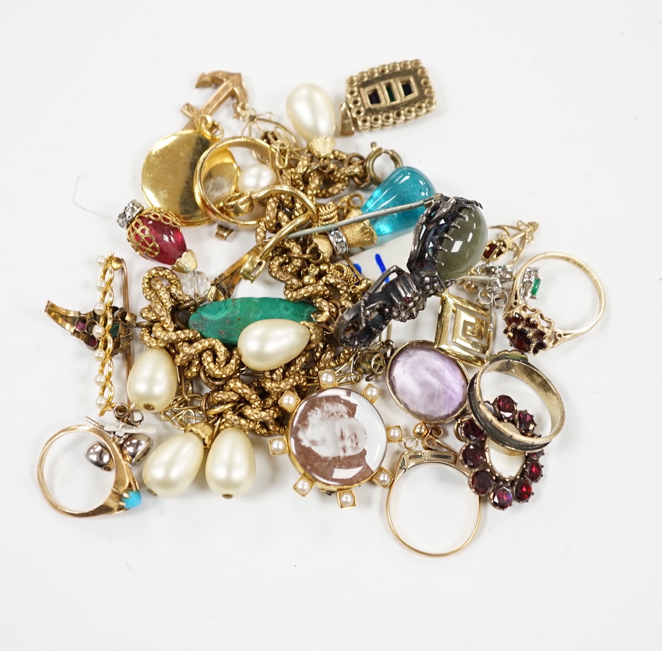 Assorted jewellery including a 9ct anchor charm, yellow metal, opal and diamond set ring, 9ct and garnet cluster ring, mourning ring, 9ct, emerald, sapphire and diamond set pendant, pair of 750 white metal and single sto